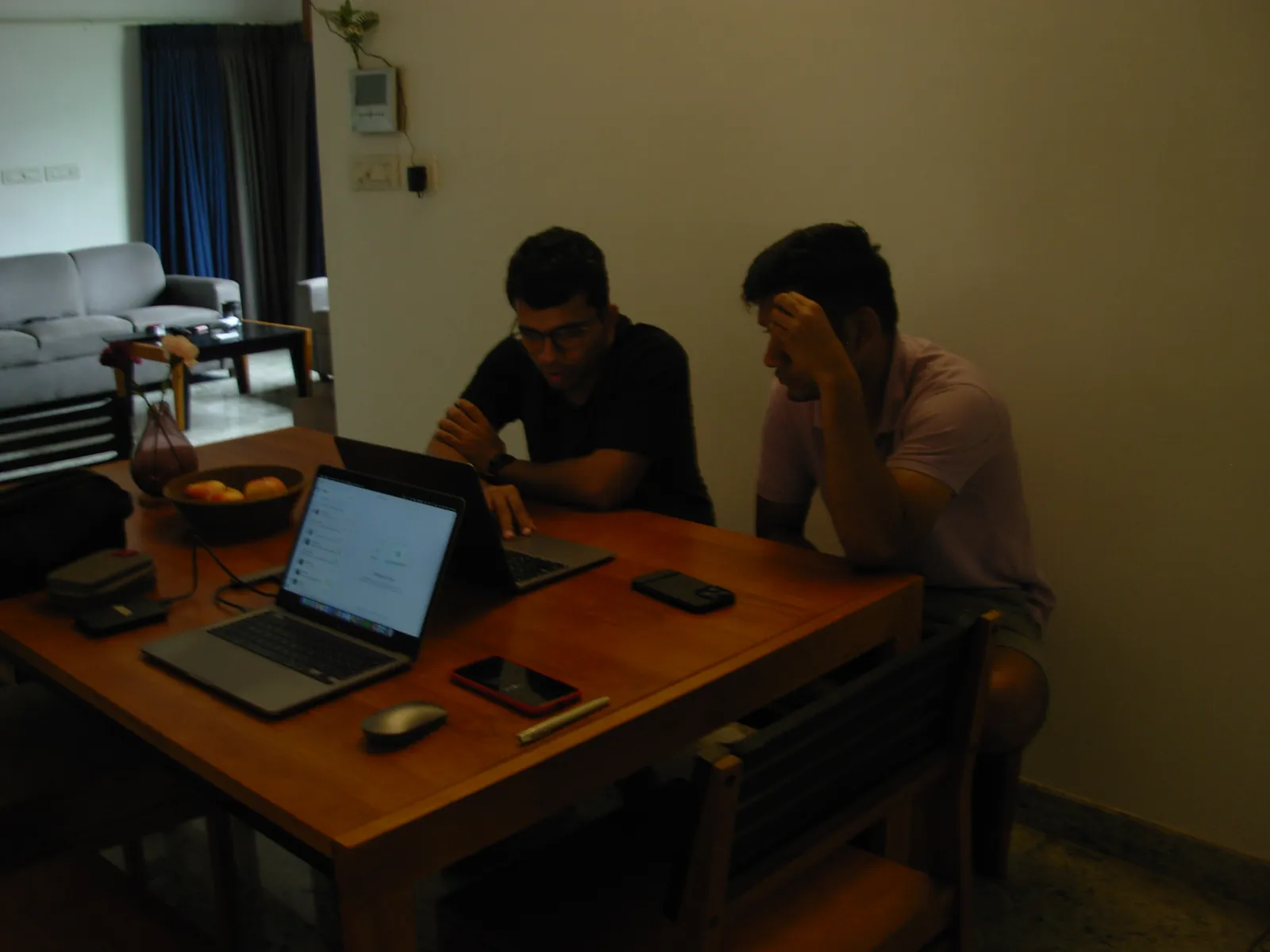 Clay Commerce co-founders Shubham and Siddhesh working together on the apps